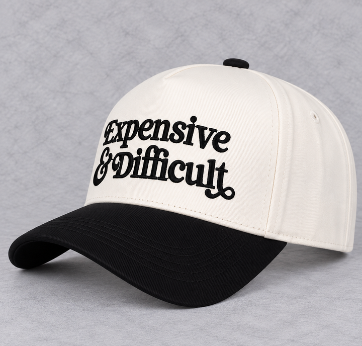 Load image into Gallery viewer, Expensive &amp; Difficult Trucker Hat | Cream &amp; Black Embroidered Statement Hat