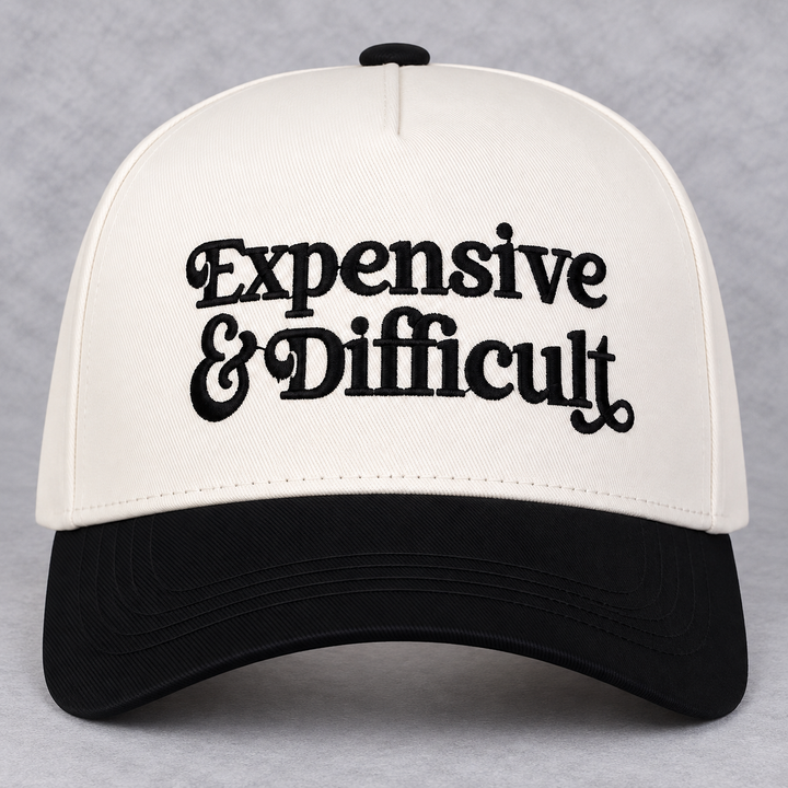 Load image into Gallery viewer, Expensive &amp; Difficult Trucker Hat | Cream &amp; Black Embroidered Statement Hat